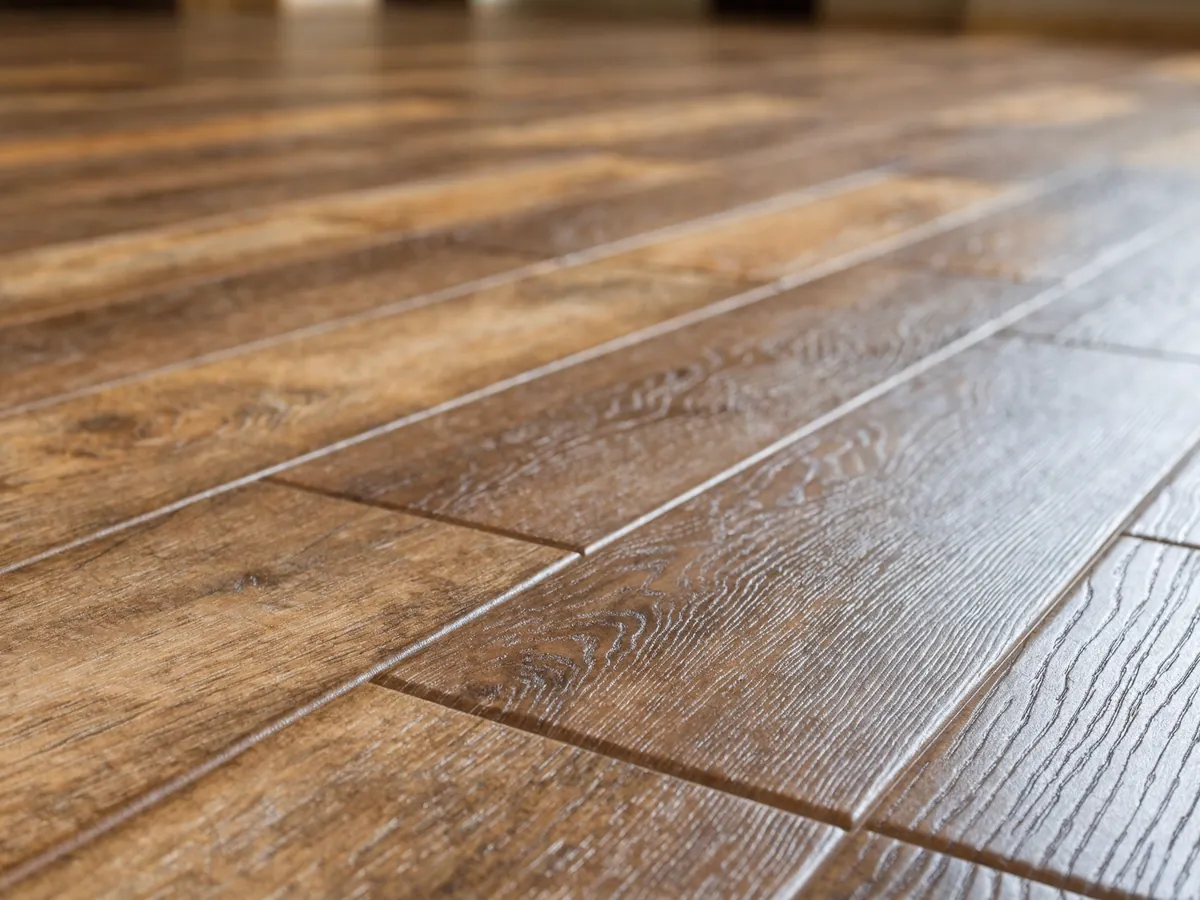 Close-up of waterproof luxury vinyl plank flooring in a wood-look finish